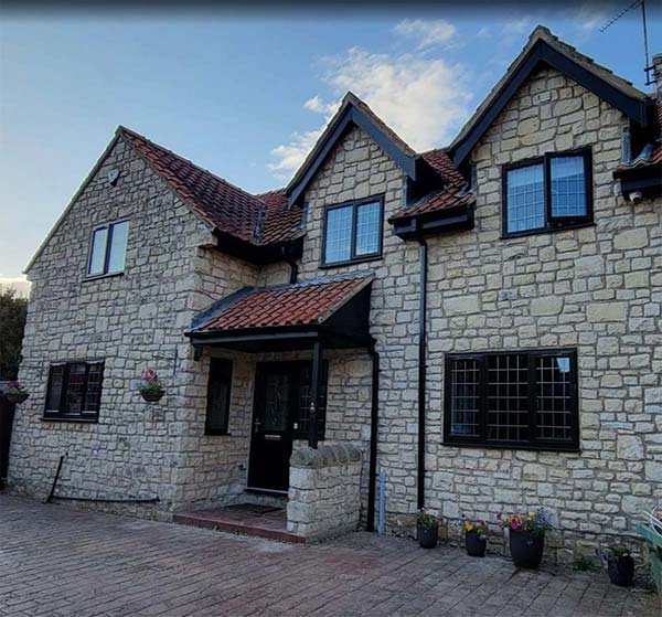 After – soffit and fascia detail, anthracite gutters